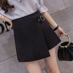 Black buckled skort